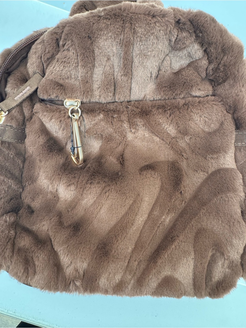 Nike Brown Faux Fur mini backpack with Gold Hardware